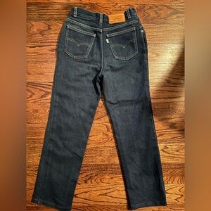 Levi's Deep Indigo High Rise Jeans with Leather Patch.